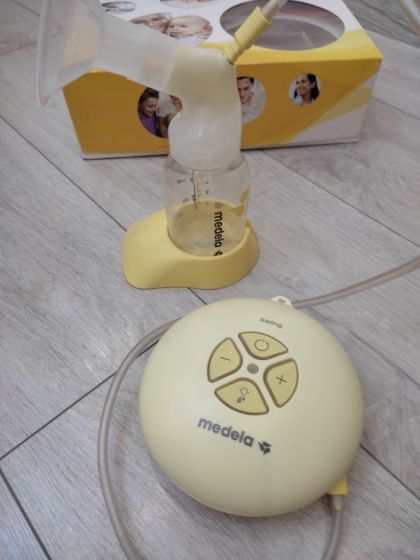 Продам молокоотсос Medela двухфазный электрический